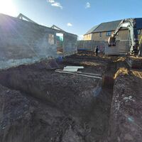 Excavation for raft foundation inside existing barn, Ashill, Somerset