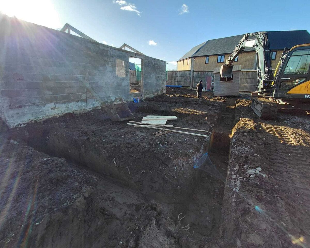 Excavation for raft foundation inside existing barn, Ashill, Somerset