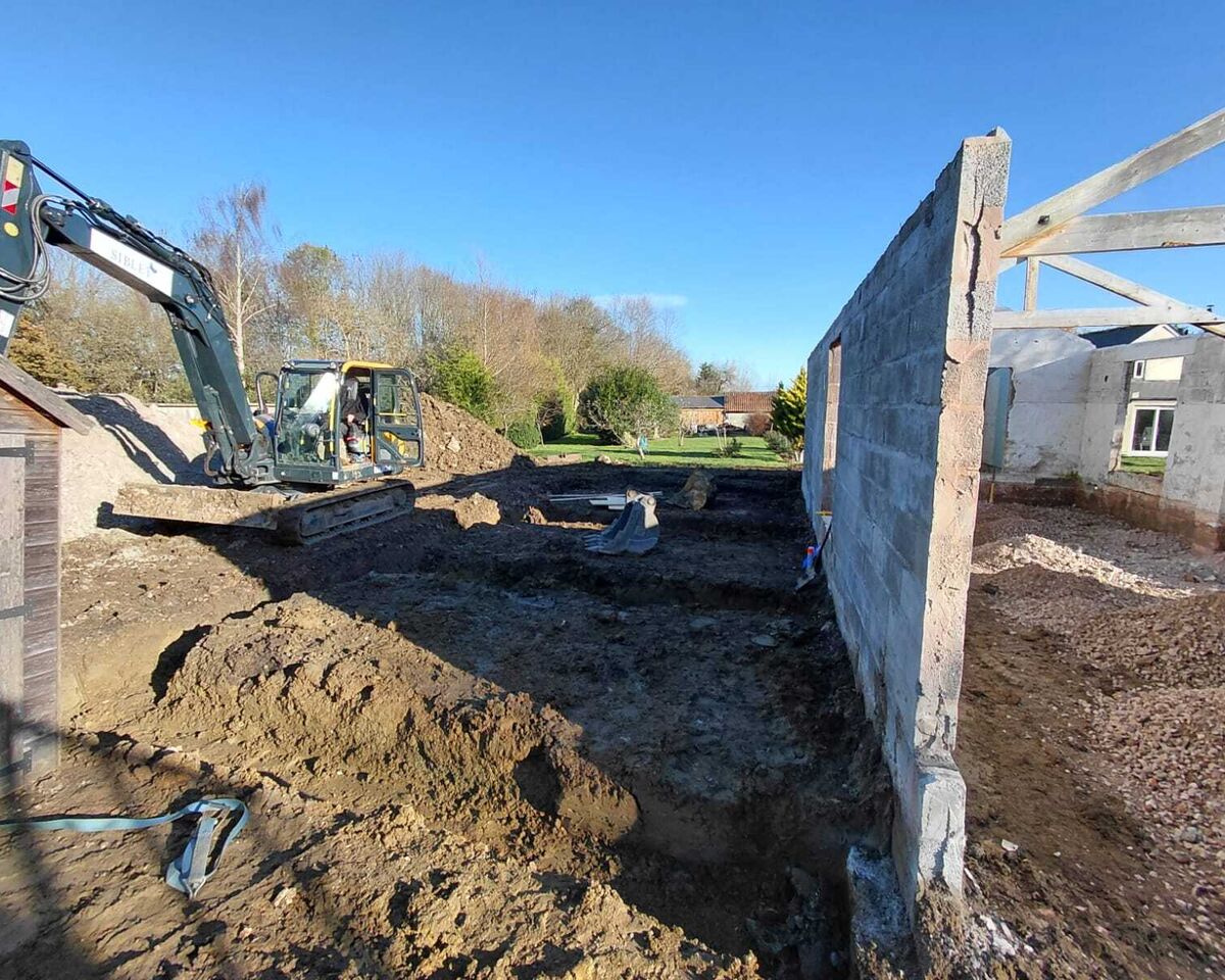 Excavating alongside existing barn wall, Ashill, Somerset